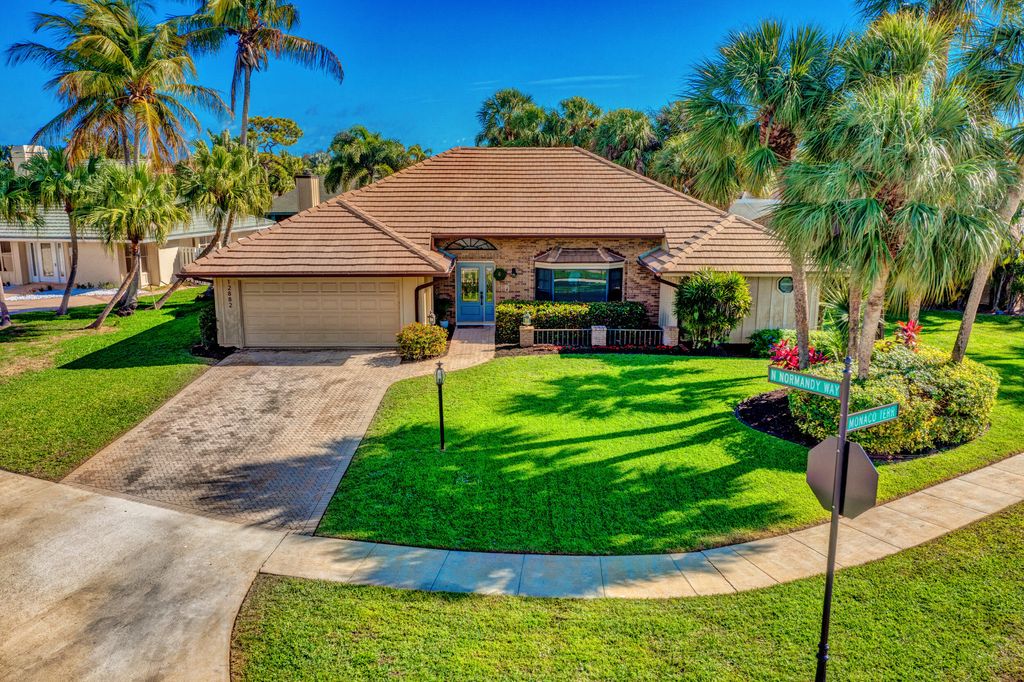 Photo of 12882 N Normandy Way, Palm Beach Gardens, FL 33410 (MLS # RX-10868827)