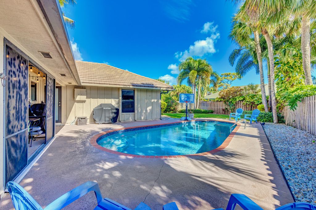 Photo of 12882 N Normandy Way, Palm Beach Gardens, FL 33410 (MLS # RX-10868827)