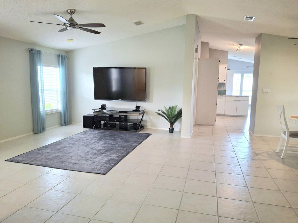 Photo of 8483 Schefflera Court, Port Saint Lucie, FL 34952 (MLS # RX-11124222)