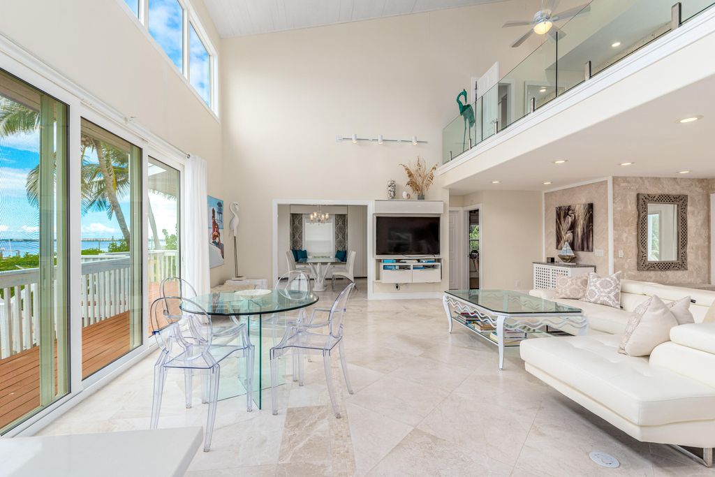 Photo of 1470 SE Macarthur Boulevard, Stuart, FL 34996 (MLS # RX-11047669)