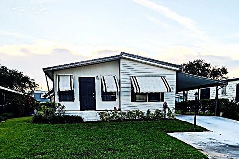 Photo of 7781 SE Shenandoah Drive, Hobe Sound, FL 33455 (MLS # RX-11126247)