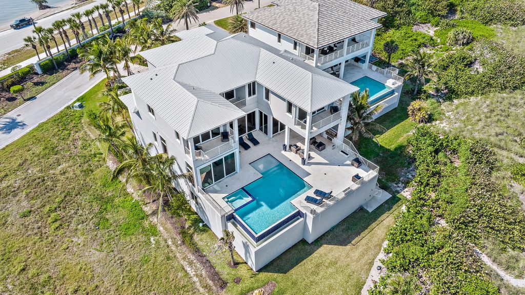 Photo of 7916 S Ocean Drive, Jensen Beach, FL 34957 (MLS # RX-11091176)