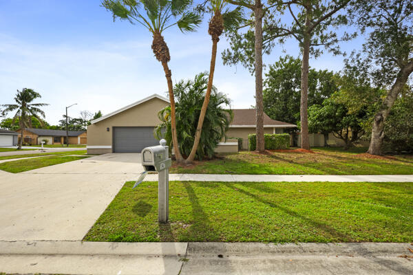 Property for Sale at 147 Parkwood Drive, Royal Palm Beach, Palm Beach County, Florida - Bedrooms: 3 
Bathrooms: 2  - $568,500