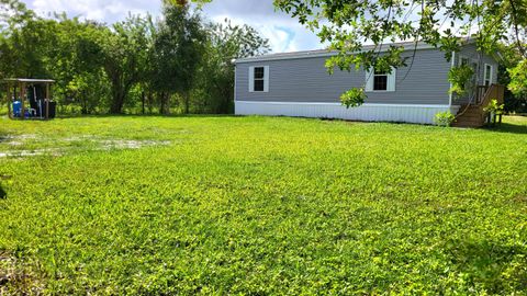 Photo of 4518 NW 11th Drive, Okeechobee, FL 34972 (MLS # RX-11129621)