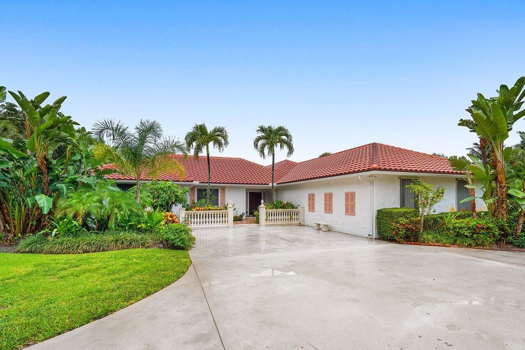 Photo of 12299 Channel Drive, North Palm Beach, FL 33408 (MLS # RX-11105420)