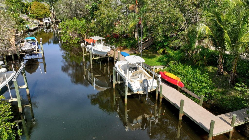 Photo of 1468 SW Peninsula Lane, Palm City, FL 34990 (MLS # RX-11115940)