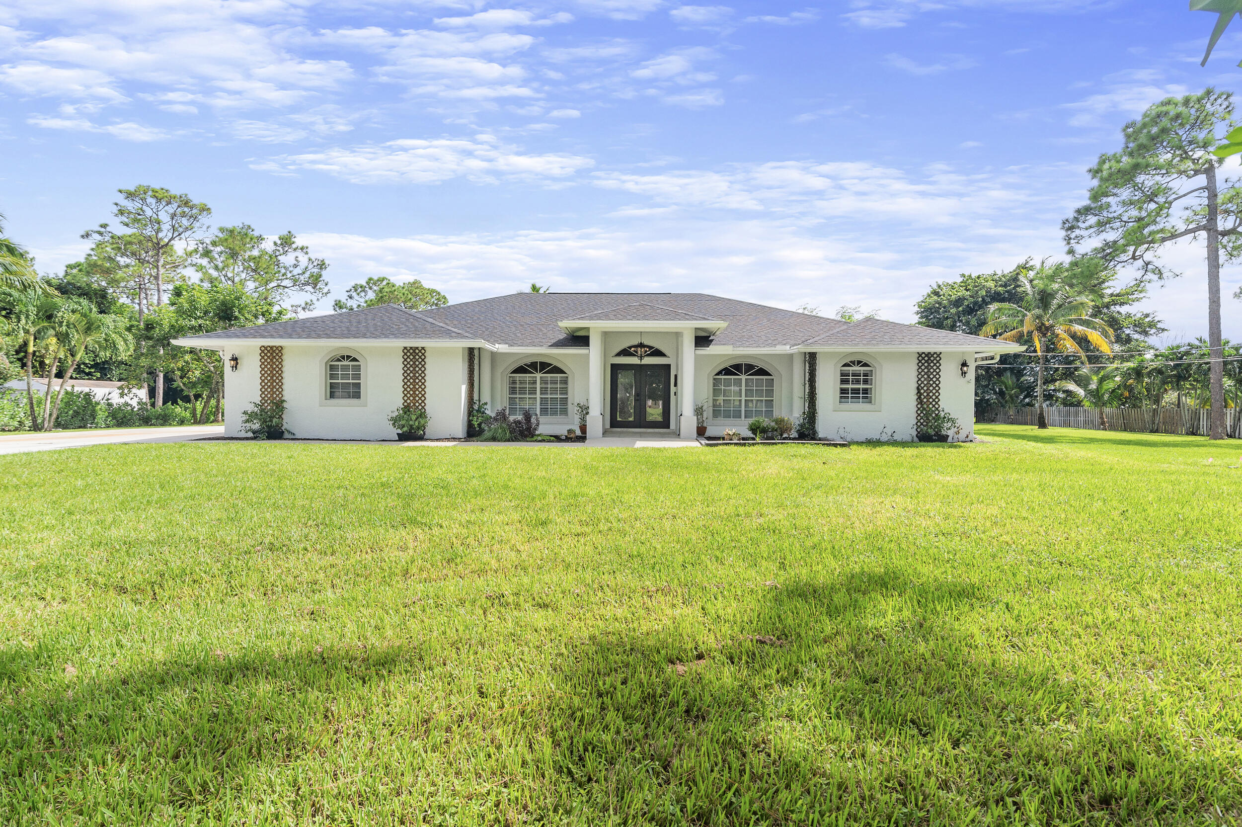 Property for Sale at 12716 Temple Boulevard, The Acreage, Palm Beach County, Florida - Bedrooms: 5 
Bathrooms: 3  - $950,000