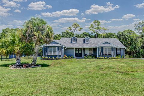 Photo of 16911 Tangerine Boulevard, Loxahatchee, FL 33470 (MLS # RX-11115404)
