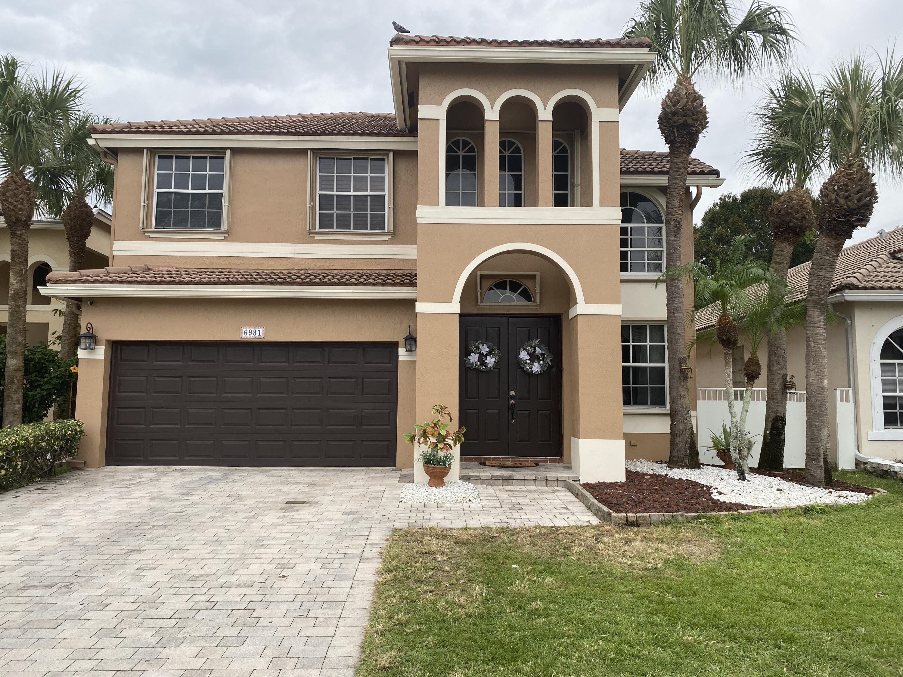 6931 Spider Lily Lane, Lake Worth, Palm Beach County, Florida - 4 Bedrooms  
3 Bathrooms - 