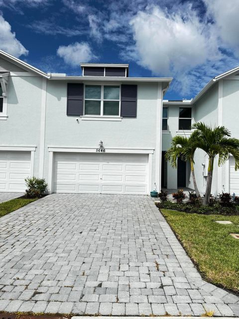 Photo of 5646 SE Edgewater Circle, Stuart, FL 34997 (MLS # RX-11116788)