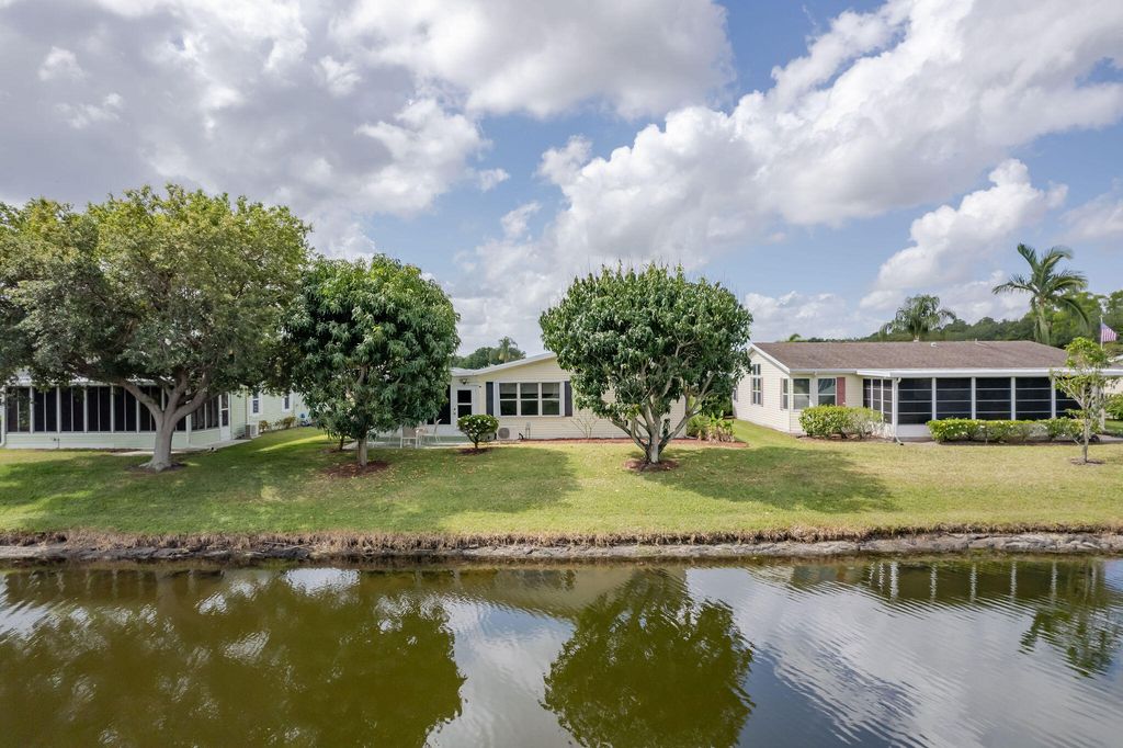 Photo of 8020 Long Drive, Port Saint Lucie, FL 34952 (MLS # RX-11087996)