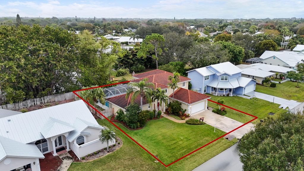 Photo of 661 NE Zebrina Senda, Jensen Beach, FL 34957 (MLS # RX-11118249)