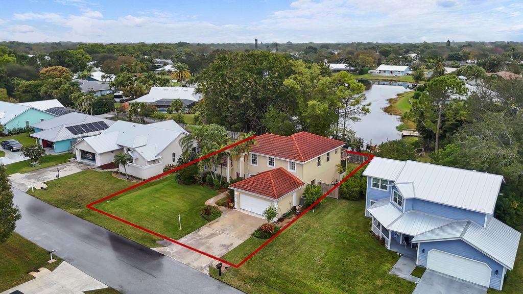 Photo of 661 NE Zebrina Senda, Jensen Beach, FL 34957 (MLS # RX-11118249)