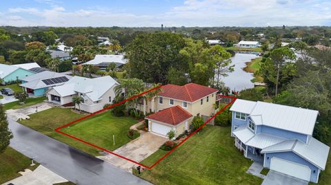 Photo of 661 NE Zebrina Senda, Jensen Beach, FL 34957 (MLS # RX-11118249)