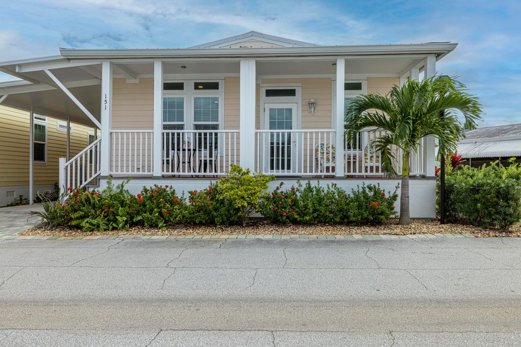 Photo of 151 NE Buoy Drive, Jensen Beach, FL 34957 (MLS # RX-11038929)