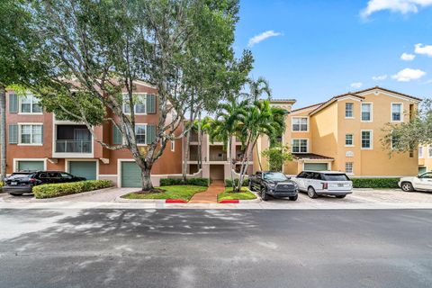 Photo of 11720 Saint Andrews Place #308, Wellington, FL 33414 (MLS # RX-11122484)