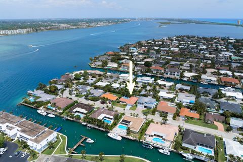 Photo of 1050 Singer Drive, Singer Island, FL 33404 (MLS # RX-11084209)