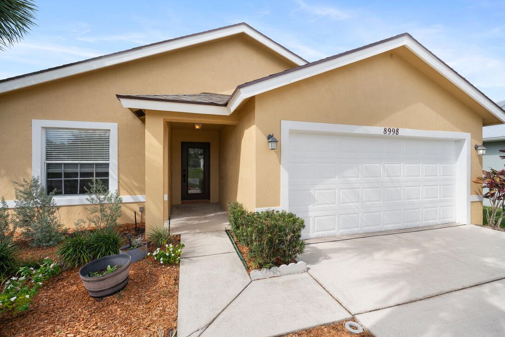 Photo of 8998 SW Bonneville Drive, Stuart, FL 34997 (MLS # RX-11089459)