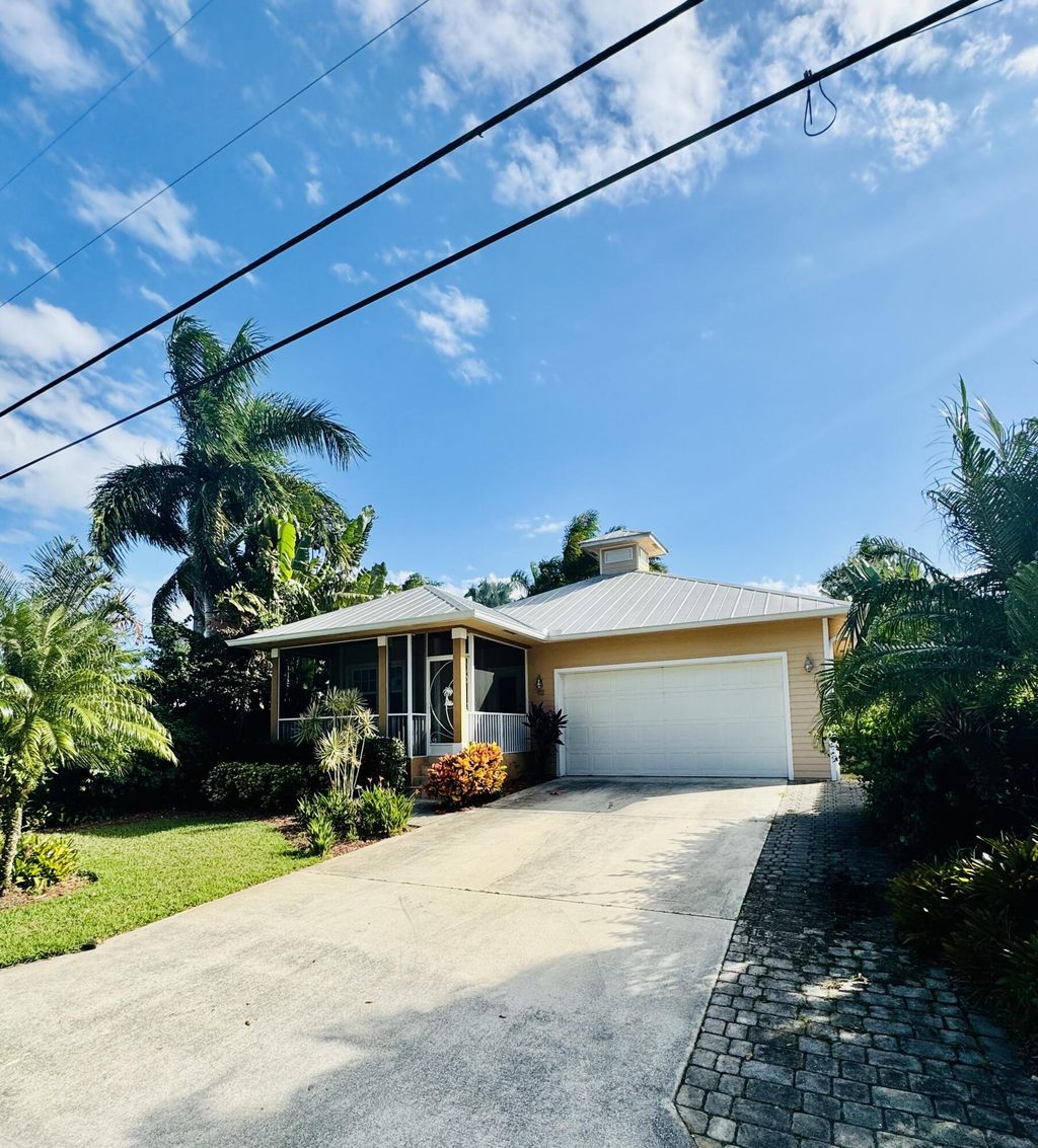 Photo of 932 SW 30th Street, Palm City, FL 34990 (MLS # RX-10930029)