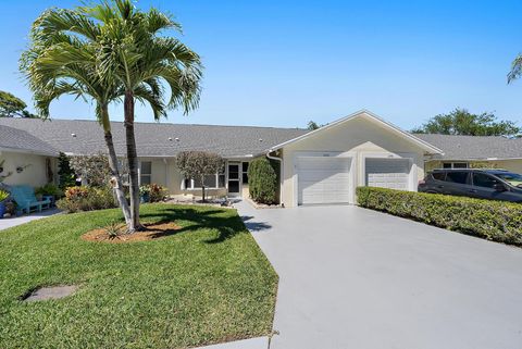 Photo of 10982 SE Sea Pines Circle, Hobe Sound, FL 33455 (MLS # RX-11073633)