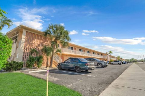 Photo of 301 E Mcnab Road #103, Pompano Beach, FL 33060 (MLS # RX-11128644)