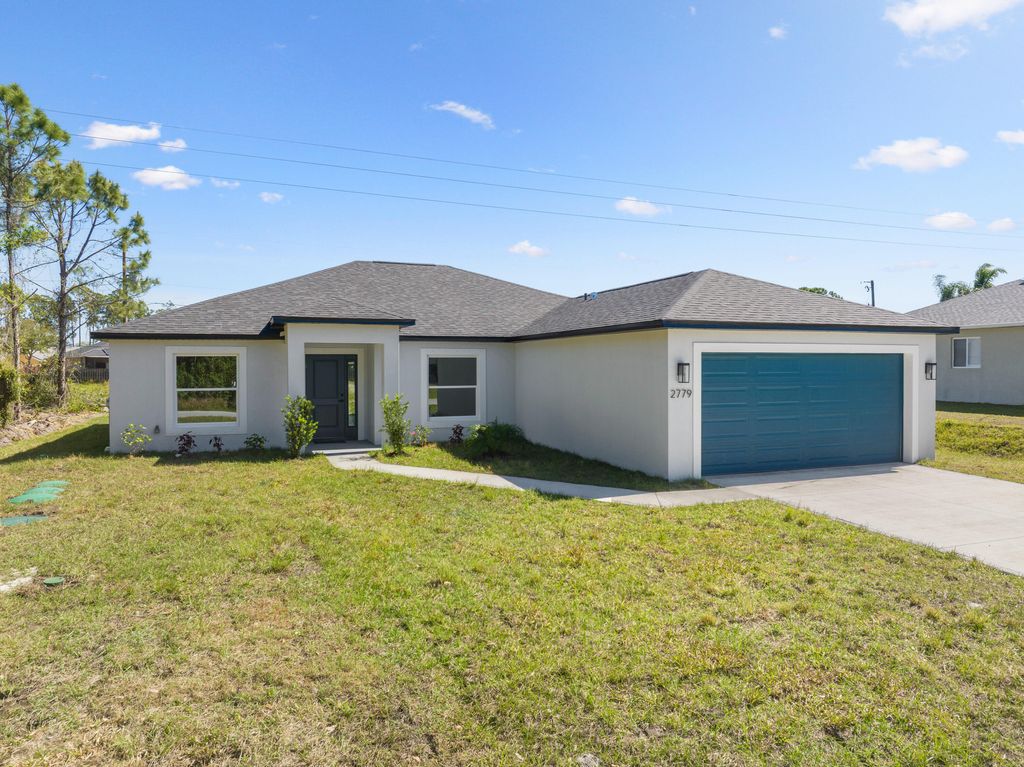 Photo of 2779 Quentin Avenue SE, Palm Bay, FL 32909 (MLS # RX-11122917)