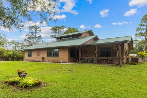 Photo of 2725 Twin Oaks Trail, Fort Pierce, FL 34945 (MLS # RX-11126360)