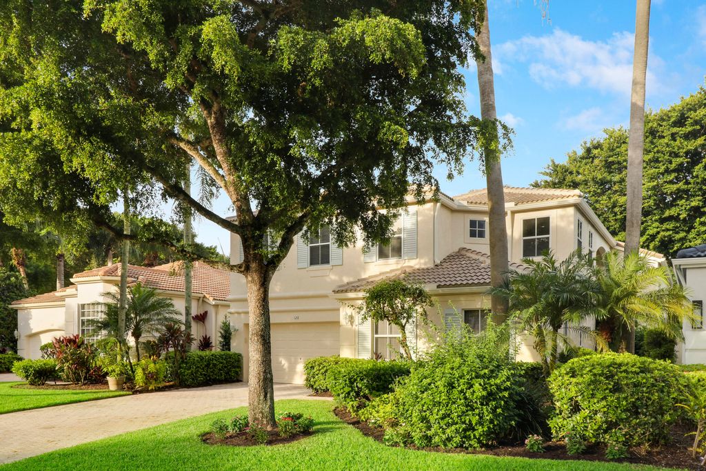 Photo of 128 Sunset Cove Lane, Palm Beach Gardens, FL 33418 (MLS # RX-10905108)