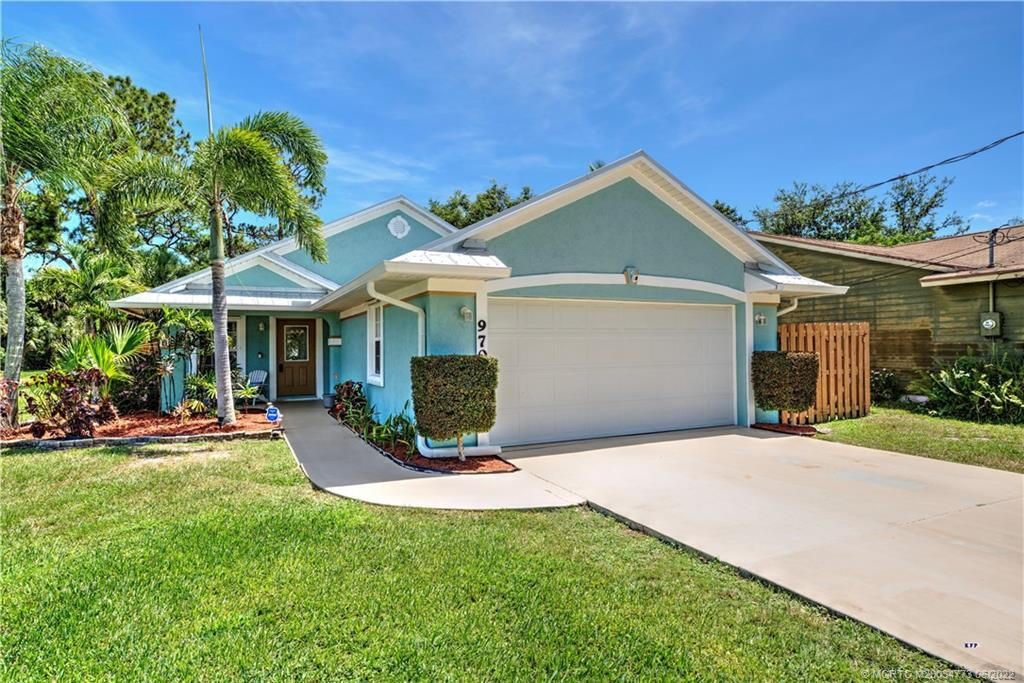 Photo of 970 SW 31st Street, Palm City, FL 34990 (MLS # RX-10893917)