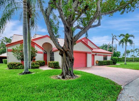 Photo of 7644 Lexington Club Boulevard #A, Delray Beach, FL 33446 (MLS # RX-11094608)