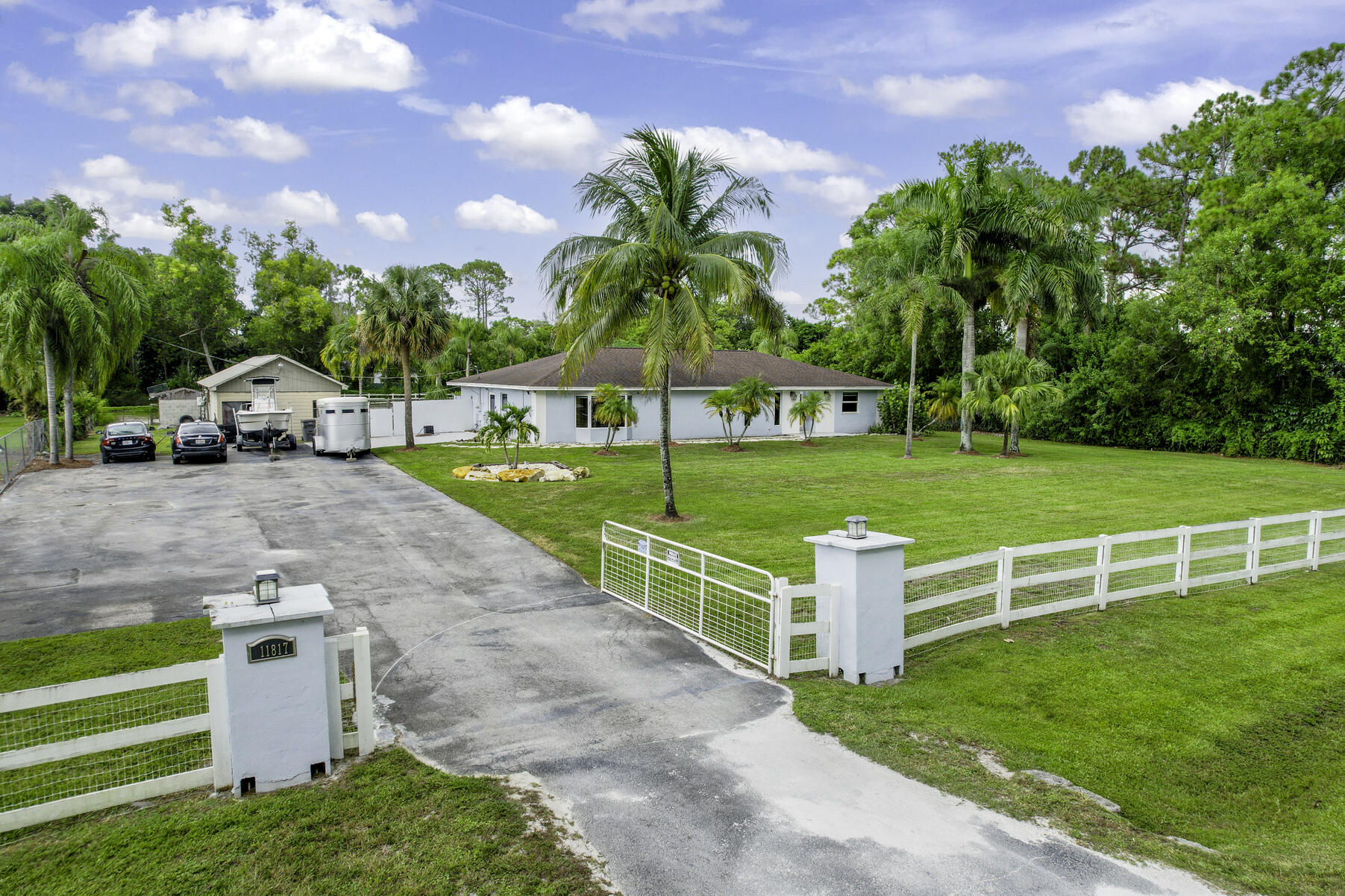 11817 46th Place, The Acreage, Palm Beach County, Florida - 4 Bedrooms  
2.5 Bathrooms - 