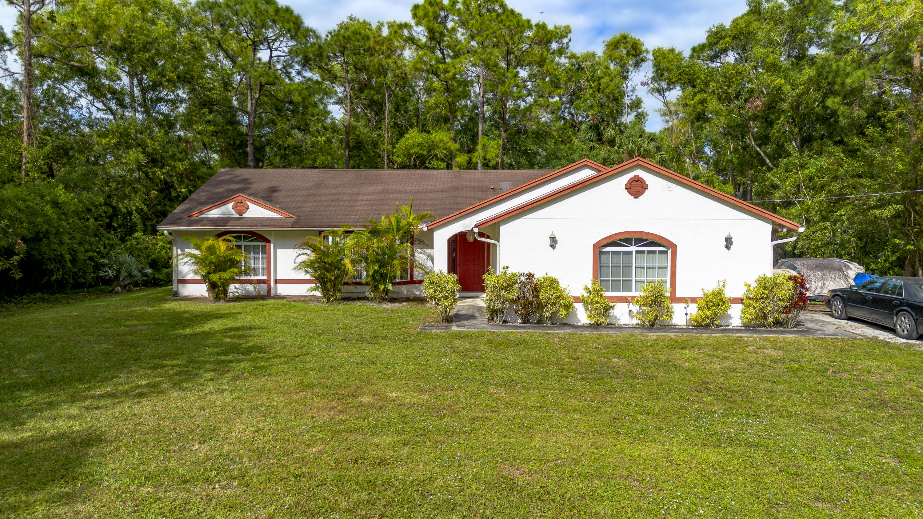 11449 61st Street, The Acreage, Palm Beach County, Florida - 4 Bedrooms  
2 Bathrooms - 