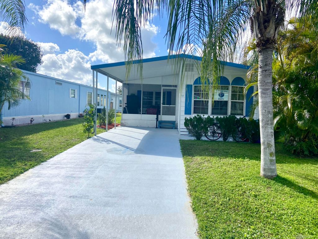 Photo of 52 Camino Del Rio, Port Saint Lucie, FL 34952 (MLS # RX-11061908)