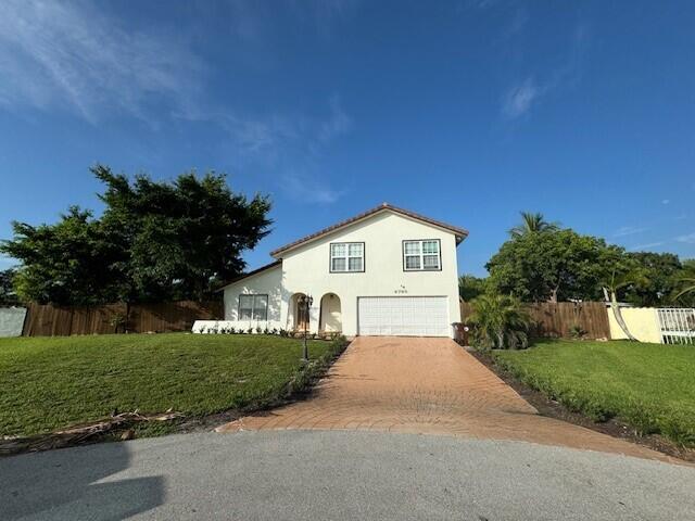 Property for Sale at 6785 Escondida Drive, Lake Clarke Shores, Palm Beach County, Florida - Bedrooms: 3 
Bathrooms: 2.5  - $899,000