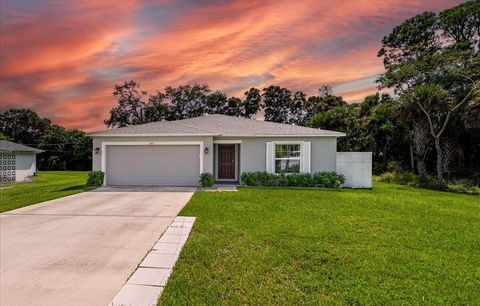 Photo of 7605 Pacific Avenue, Fort Pierce, FL 34951 (MLS # RX-11128071)