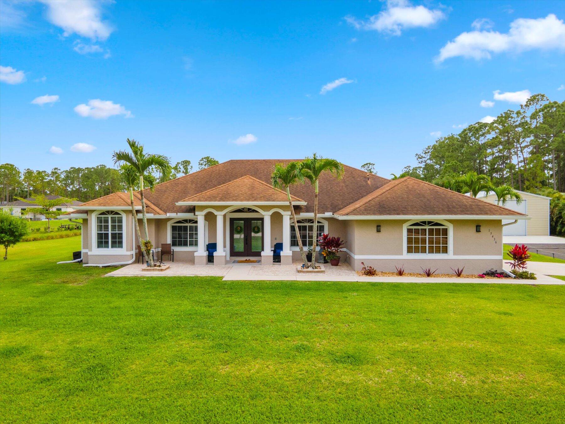 Property for Sale at 15436 66th Court, The Acreage, Palm Beach County, Florida - Bedrooms: 6 
Bathrooms: 3.5  - $1,050,000