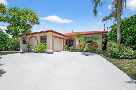 Photo of 1035 Soelca Drive, West Palm Beach, FL 33405 (MLS # RX-11127956)