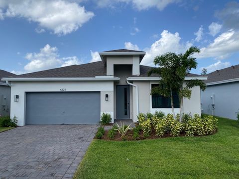 Photo of 6821 SE Park Trace Drive, Stuart, FL 34997 (MLS # RX-11060970)