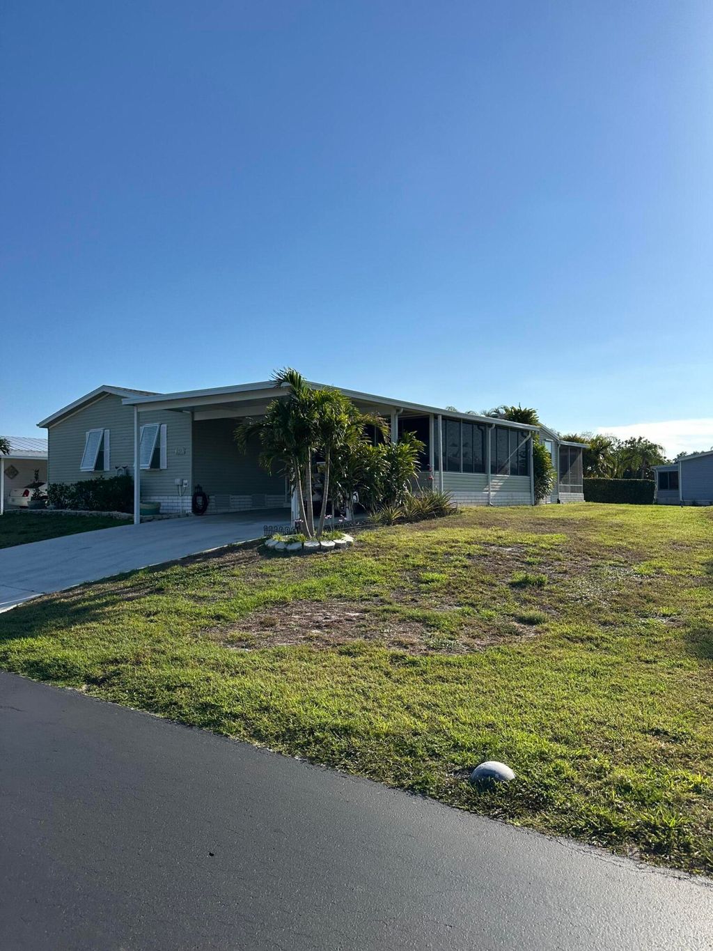 Photo of 553 Tropical Isles Circle, Fort Pierce, FL 34982 (MLS # RX-11081744)