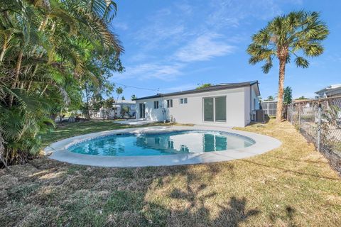 Tiny photo for 120 NE 57th Court, Oakland Park, FL 33334 (MLS # RX-11110425)