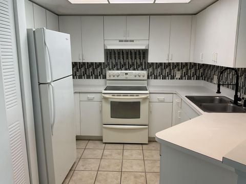 Photo of 4175 N Haverhill Road #905, West Palm Beach, FL 33417 (MLS # RX-11128786)
