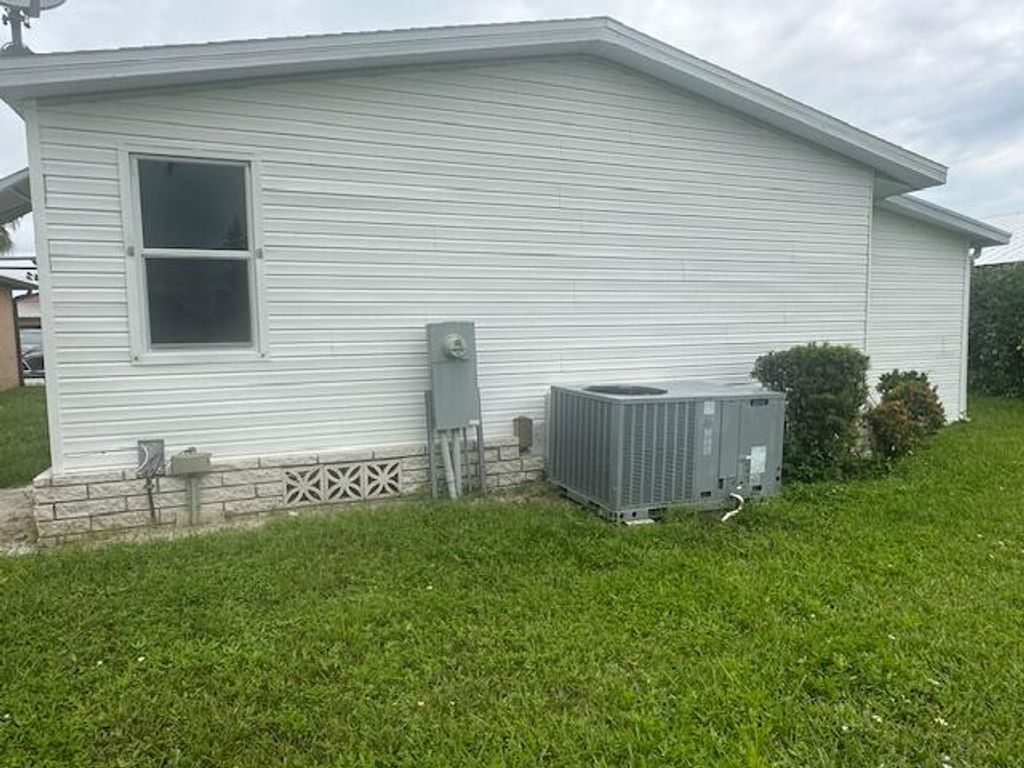 Photo of 6685 Lila Ct. Court, Fort Pierce, FL 34951 (MLS # RX-11124836)