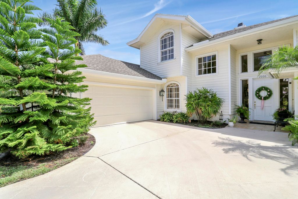 Photo of 2000 SW Oakwater Point, Palm City, FL 34990 (MLS # RX-11104213)