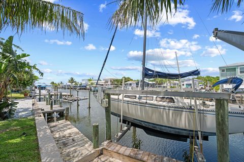 Photo of 96 Aqua Ra Drive, Jensen Beach, FL 34957 (MLS # RX-11117864)