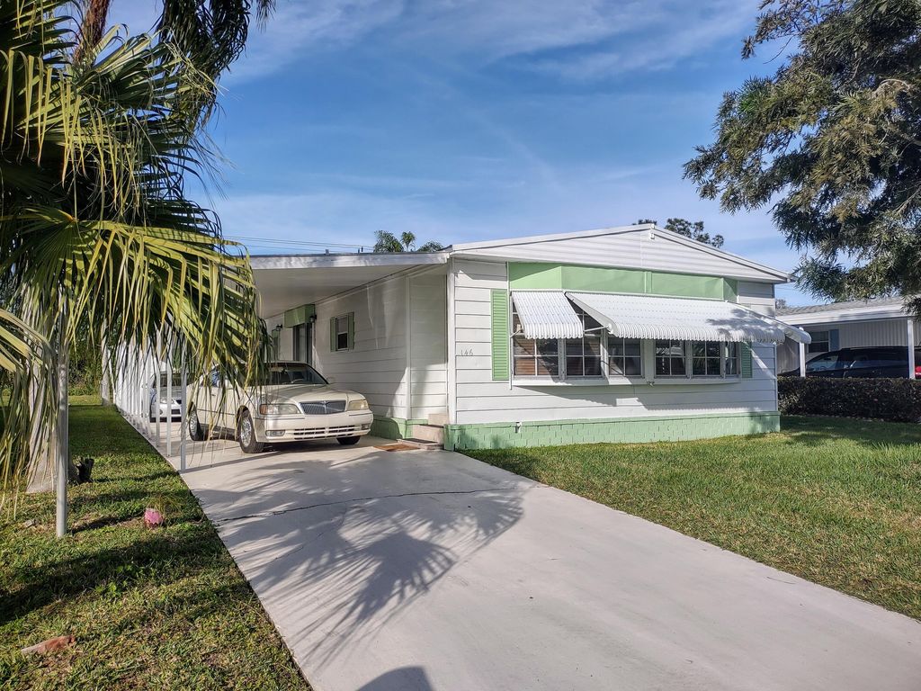 Photo of 146 W Caribbean, Port Saint Lucie, FL 34952 (MLS # RX-11024833)