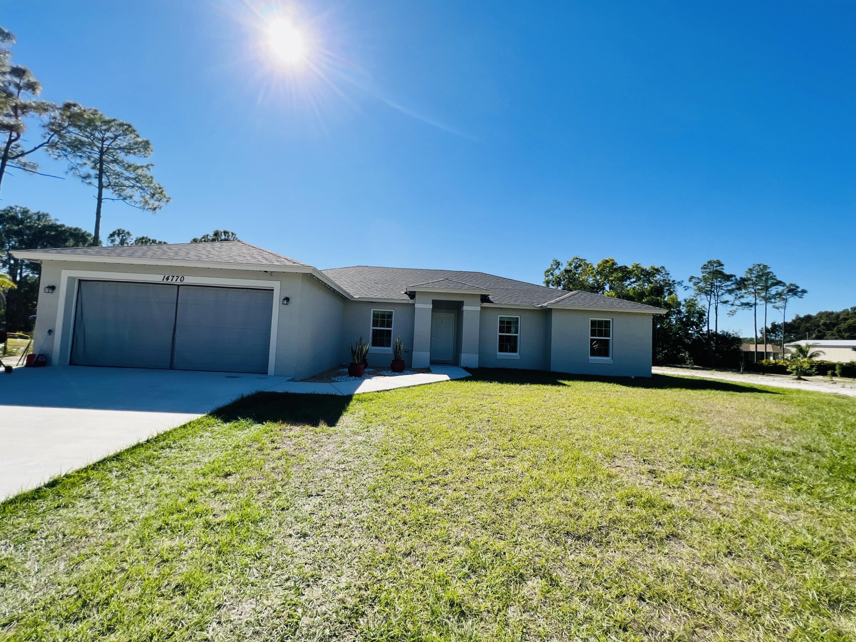 14770 63rd Court, The Acreage, Palm Beach County, Florida - 4 Bedrooms  
2 Bathrooms - 