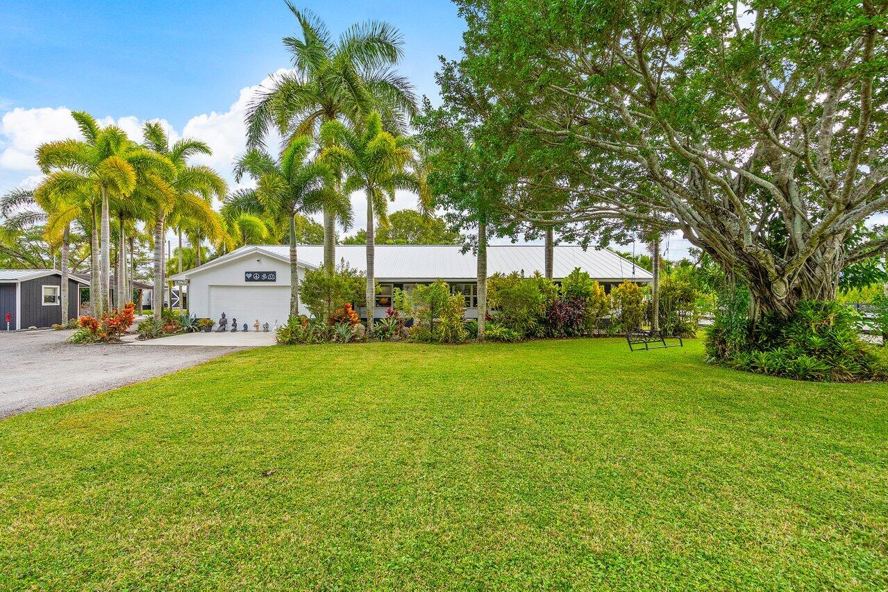 10782 58th Road, Lake Worth, Palm Beach County, Florida - 4 Bedrooms  
3.5 Bathrooms - 