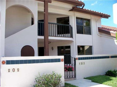 Photo of 6070 SE Martinique Drive #103, Stuart, FL 34997 (MLS # RX-11119801)