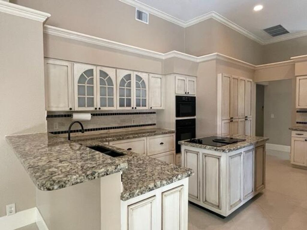 Photo of 12837 Calais Circle, Palm Beach Gardens, FL 33410 (MLS # RX-10834549)