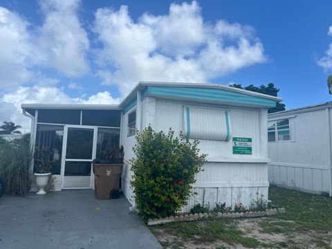 Photo of 117 NW 50th Street, Pompano Beach, FL 33064 (MLS # RX-11129449)